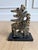 Signed vintage abstract sculpture executed in solid cast bronze and mounted on a black marble base. The compact work has...