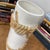 Early 20th Century White Black Cylindrical Ceramic Vase with Rope Design For Sale - Image 9 of 11