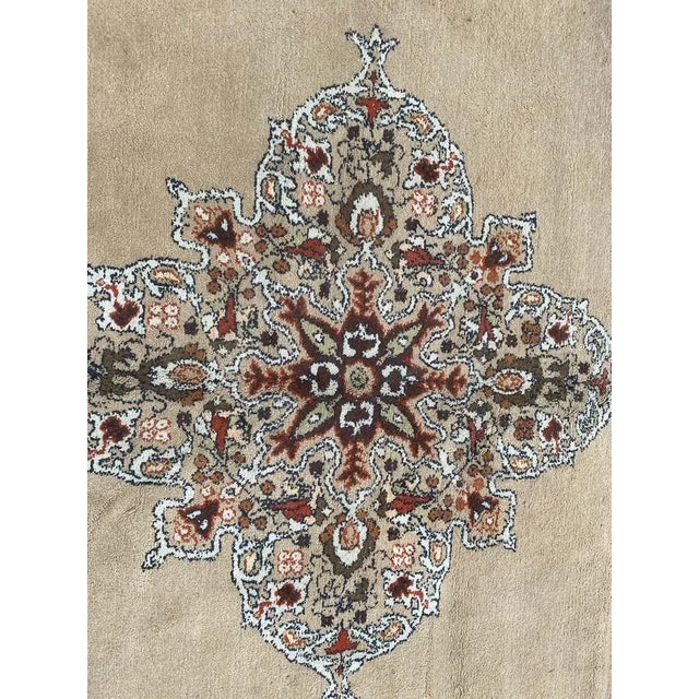 Beautiful vintage Moroccan rug with a central medallion design and light colors with yellow, green, orange, purple and...