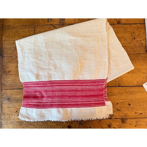 Vintage Raw Linen Dresser Scarf or Table Runner with Red Striped Accents & Hand Applied Fringe. The red striped accent is...