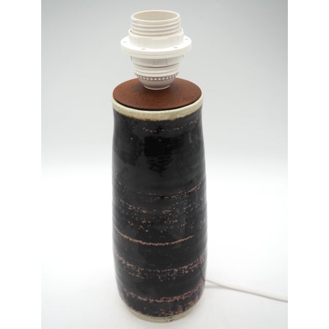 An elegant and characterful stoneware lamp from Rörstrand Studio, designed and signed by Sylvia Leuchovius, one of...
