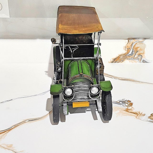 This vintage 1916 Chevrolet Baby Grand Touring Car model is a finely crafted decorative collectible measuring 14.5"L x...