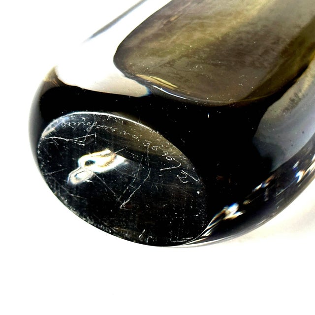 Mouth-blown art glass from the Scandinavian master Nils Landberg for Orrefors, Sweden. It has pleasing oval form and a...