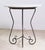 Vintage wrought iron side table with a newly installed, still antique, white marble top. The scrolled iron legs pair...