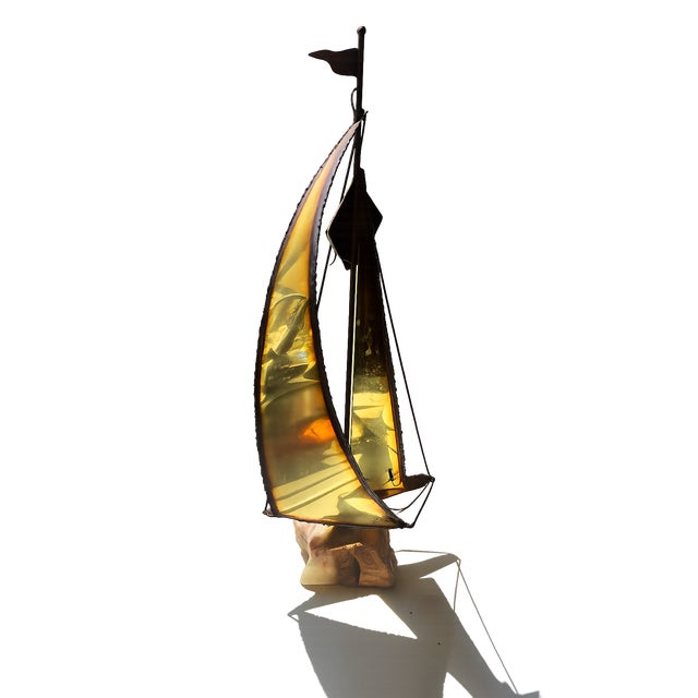 Mid-Century Modern Brass Sailboat Sculpture on Quartz Base by Jere DeMott, USA, 1960s A striking Mid-Century Modern brass...