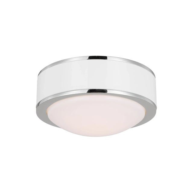 The Monroe LED flush mount is inspired by graphic enameled metal jewelry and decorative accessories from kate spade with a...