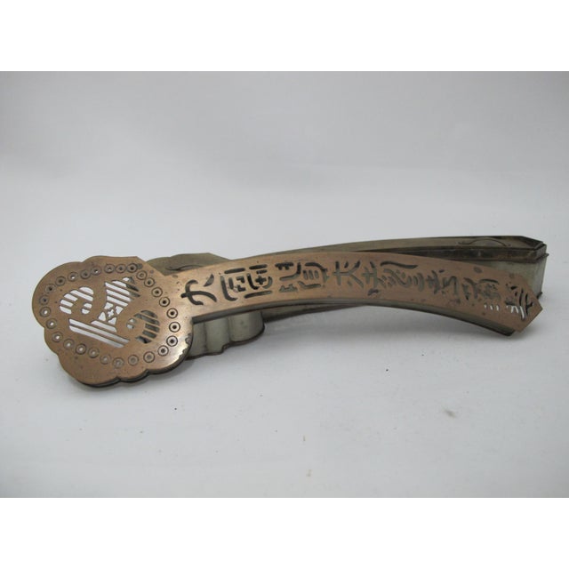 Chinese brass Paktong incense burner clock in Ruyi Scepter form. This type of device was used in ancient China for...