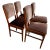 These chairs were made in Sweden. They're made of teak and have velour upholstery. They have a Danish Modern style.