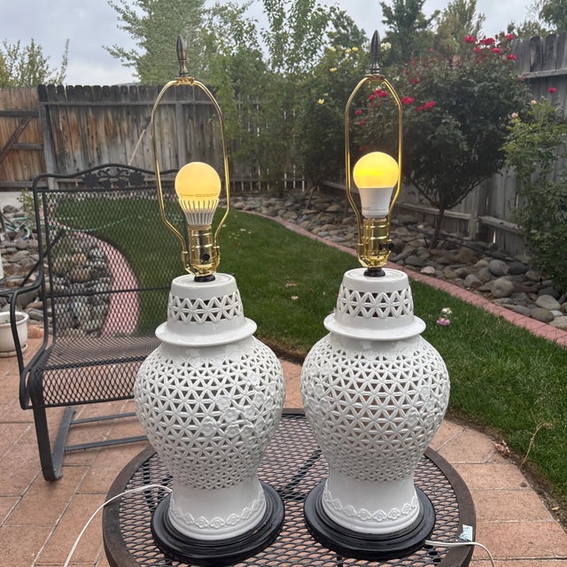 A pair of Seyei Fine Porcelain lamps that date to the 1950's Japan that are really stunning. They are a true pair and one...