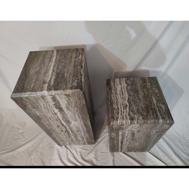Great to showcase art, plants, or sculptures. Elevate your space with this stunning, sold-out CB2 Tura Tall Brown...