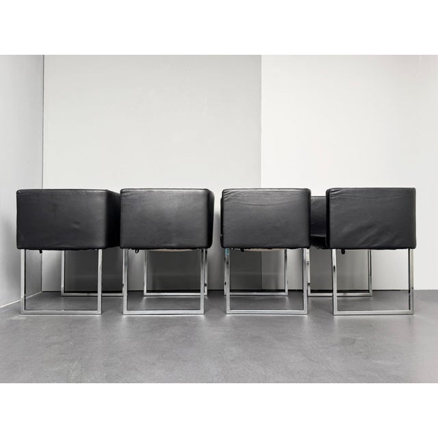 Cubica Armchairs in Black Leather by Tito Agnoli for Zanotta, Italy, 2010s, Set of 4, in Very Good conditions. Designed...