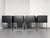 Cubica Armchairs in Black Leather by Tito Agnoli for Zanotta, Italy, 2010s, Set of 4, in Very Good conditions. Designed...