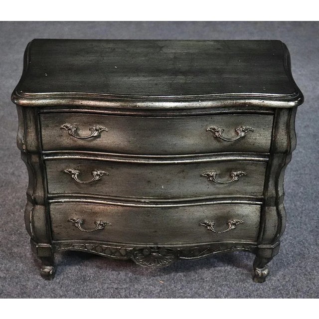 This is a beautiful silver finished over a black ground, jewelry chest or salesman's sample that can be used in any way...