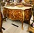A true masterpiece of French-inspired luxury, this stunning Louis XV Bombe Commode showcases an elegant serpentine...