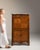 This 19th century Louis XVI secretary cabinet with marble top from France is made in figured, quartered veneer with a...