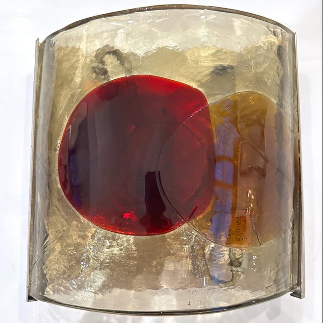 A single modernist art glass sconce,"Dot" Design by Fulvio Bianconi for Venini. The sconce consists of a single 5/8" thick...