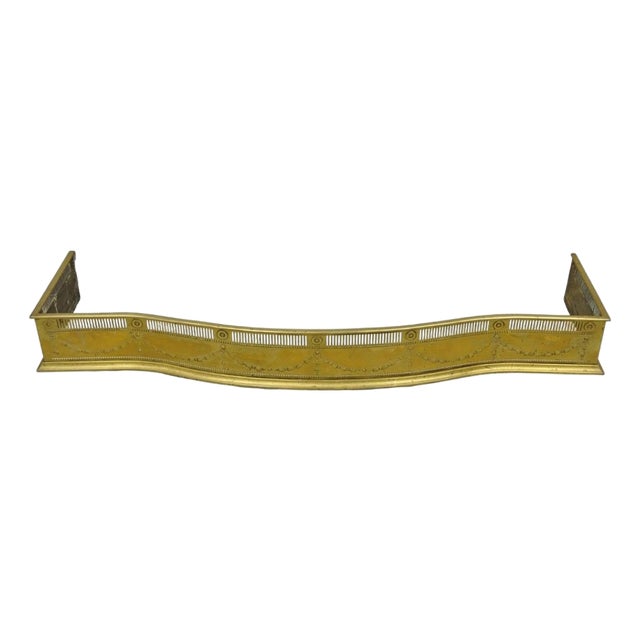 Antique English Victorian Serpentine Drape & Bellflower Brass Fireplace Fender For Sale