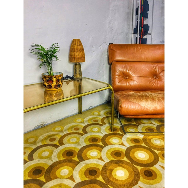 Mid-century modern rug, by Ferenc Fekete, 1970s. with its bright yellow colors and circular pattern, it is a really nice...