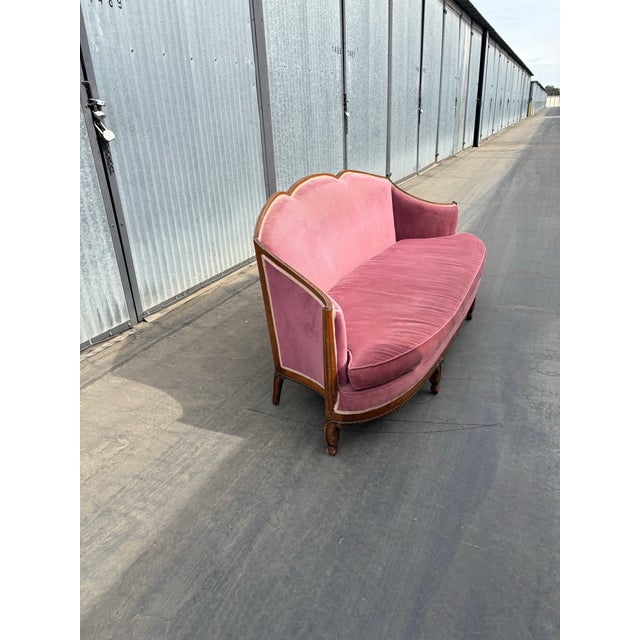 Oh such a dreamy pink color in the original upholstery believed to be by Sue et Mare. Very sturdy original hand carved...
