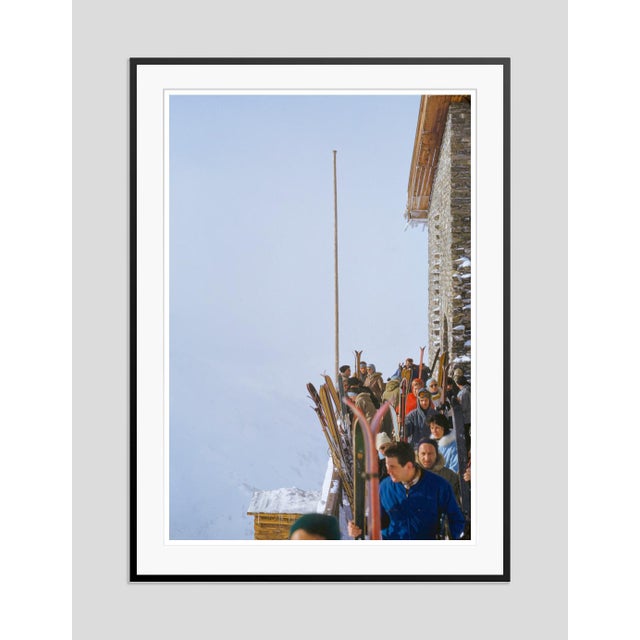 Val d’Isère by Toni Frissell A crowded terrace of skiers outside a stone lodge in Val d’Isère, France, circa 1959. (Toni...