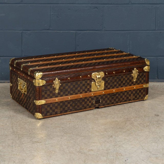 An exceptional and early Louis Vuitton steamer trunk dating to circa 1890, finished in the classic damier canvas, one of...