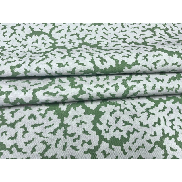 Remnant of Thibaut Maldives fabric in Blue and Green. It has upholstery backing. Price is per yard. Content: 100% Cotton...