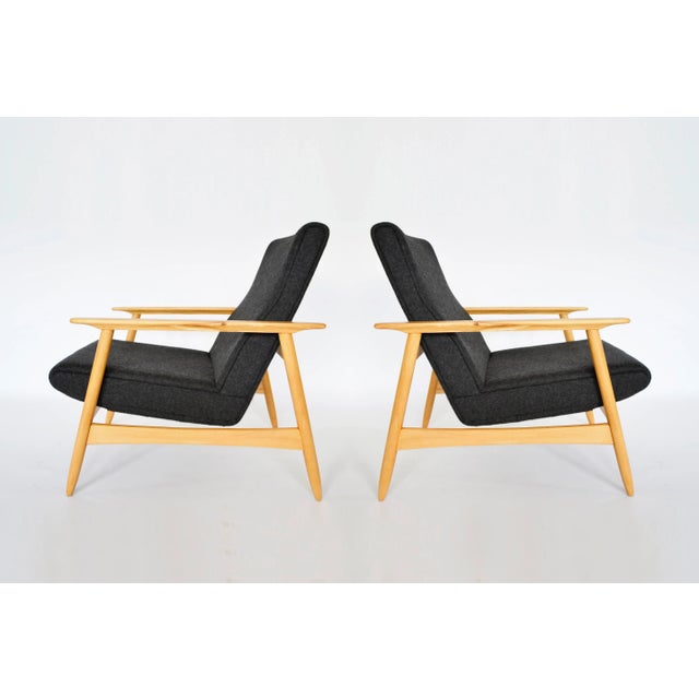 This pair of Ąžuolas Armchairs was designed in the 1960s by legendary Lithuanian modernist architect Valerija Ema...