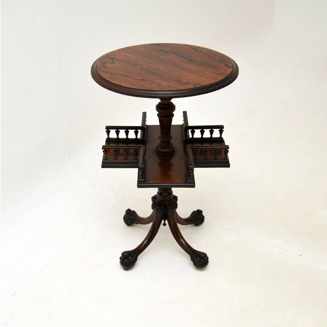 A smart and exceptionally well made antique Victorian revolving bookcase / occasional table. This was made in England, it...