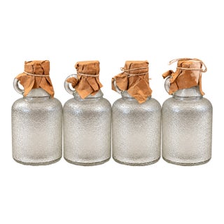 1920s Illinois-Pacific Ipg Textured Glass Jugs With Covered Stoppers, Set of 4 For Sale