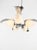 "It stands out due to its unusual, egg-shaped (ovoid) opal glass diffusers, a rare design element for this era." (It...