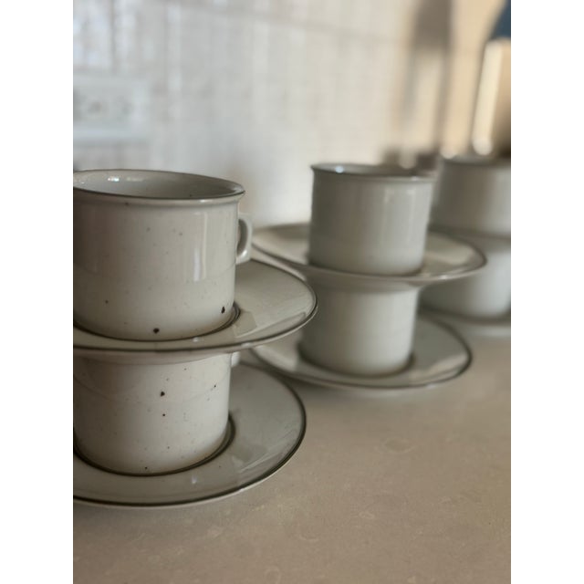 Add classic Scandinavian modern style to your table with this set of 8 vintage Dansk coffee cups and saucers in the rare...