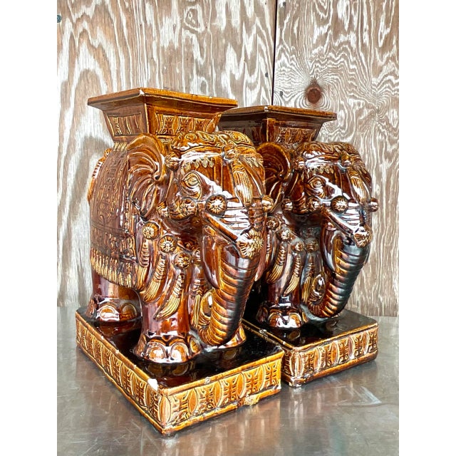 Fantastic pair of vintage glazed ceramic garden seats. The highly coveted “Root Beer” elephants with beautiful rich brown...