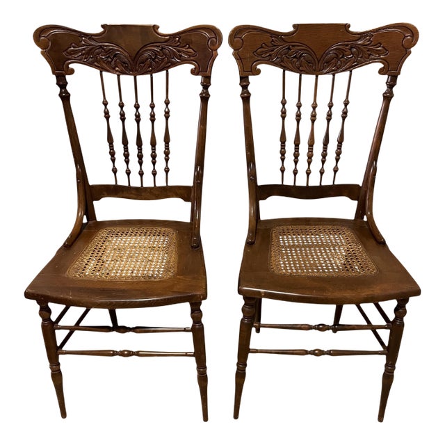 A Pair of Antique Oak Press Back Side Chairs With Cane Seats For Sale