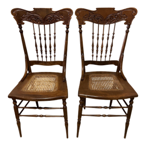 A Pair of Antique Oak Press Back Side Chairs With Cane Seats