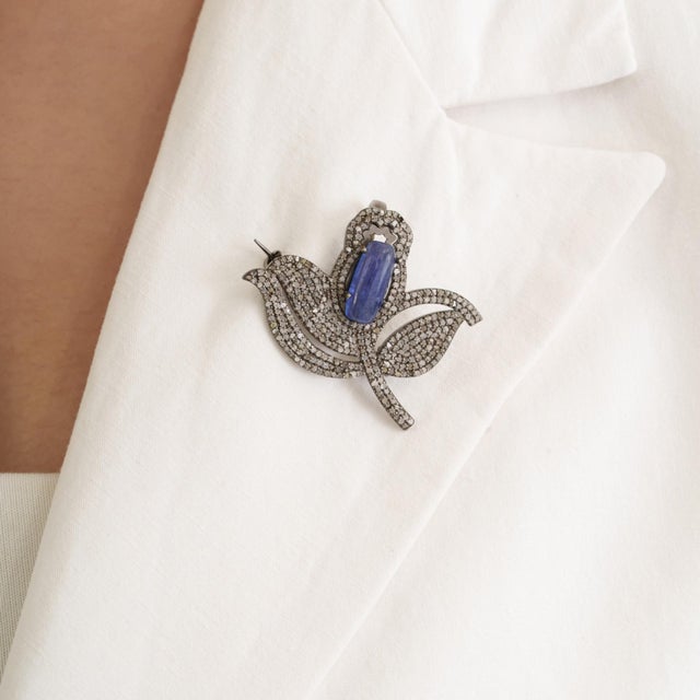 Tanzanite & Diamond Tulip Convertible Brooch Pendant in 925 Sterling Silver Bring distinctive floral-inspired elegance to...