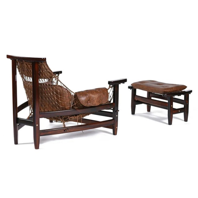 Jean Gillon, Jangada Armchair, rosewood, nylon rope, leather, Brazil, 1968. This robust and hefty armchair is designed by...