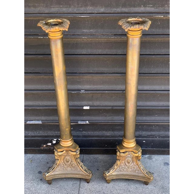 Gorgeous pair of bronze candle holders with incredible design details made in solid bronze with ram heads, flowers and...