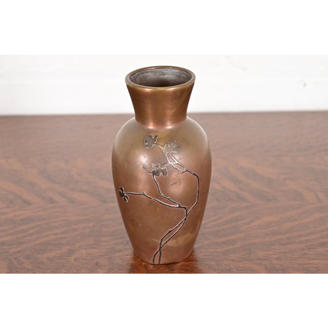 A beautiful Arts & Crafts period sterling silver on bronze vase with floral design By Heintz Art Metal Shop USA, Early...