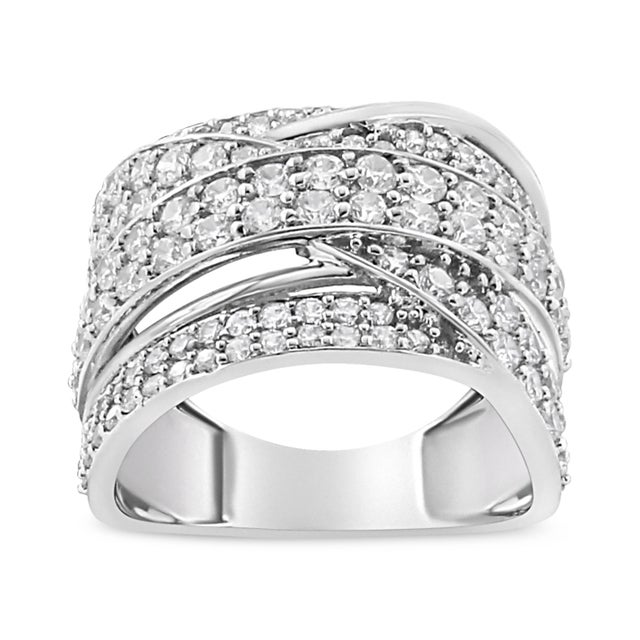 Bold and striking, this glamorous diamond band is crafted from genuine .925 sterling silver, a metal that will stay...