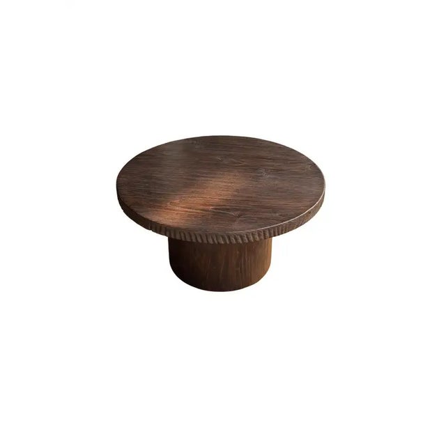 Introducing our exquisite organic Teak wood round table, beautifully crafted with a striking burnt finish that enhances...