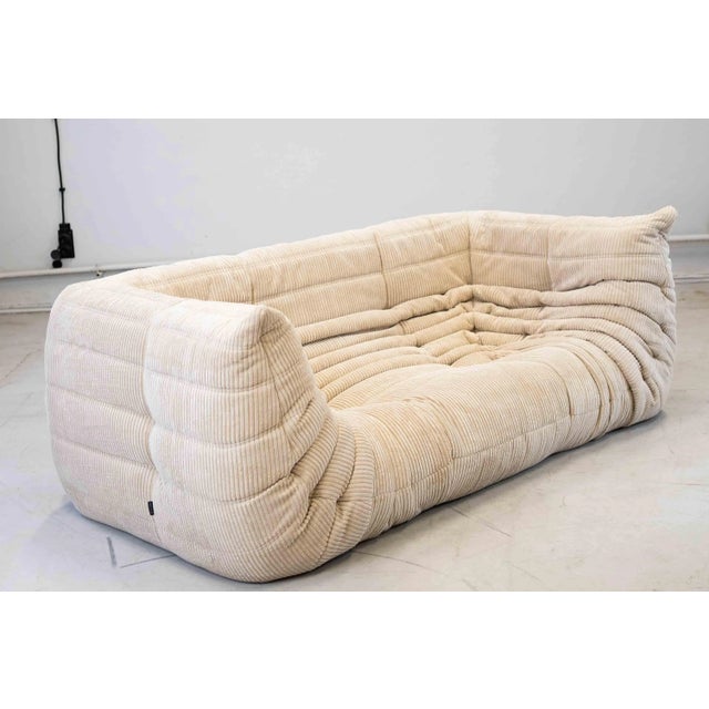 This Togo has been reupholstered with new foam and high-quality new fabric, keeping its inner structure giving the item...