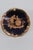 This lovely miniature plate is made of Porcelain and comes with a metal stand. This dainty porcelain collectible features...