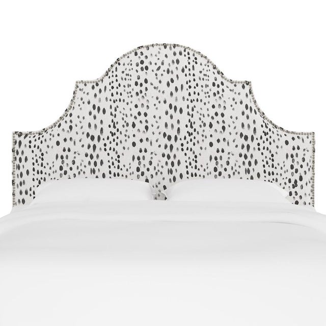 Classic curves wrapped in smooth upholstery, then accented with elegant ornamental nailheads, gives this Upholstered...