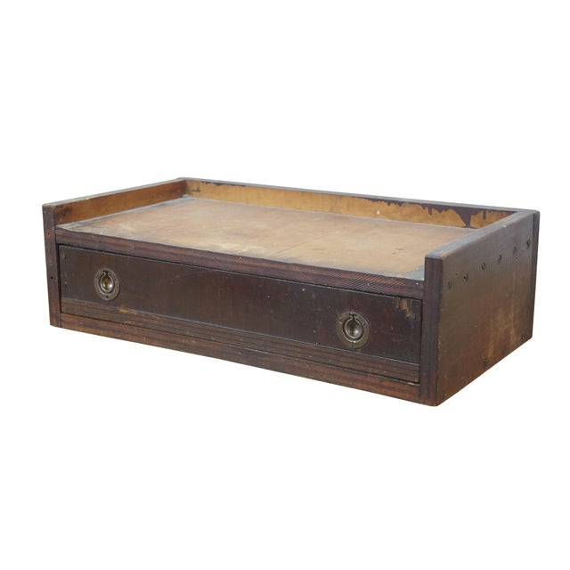 Antique wooden divided apothecary style box drawer with gallery top writing / work surface and brass hardware. Dimensions:...