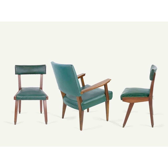 Vintage set of 1 armchair and 2 chairs in wood and padded viny leather. Some signs of use by overall good condition....