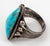 Vintage Native American Navajo silver turquoise ring, comprise of one 21 x 17 mm triangular cabochon-cut turquoise. Ring...