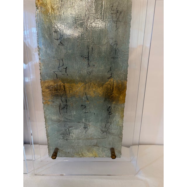 Artist Michelle Youell created these three mixed media abstract triptych panel paintings in acrylic floating frames and...