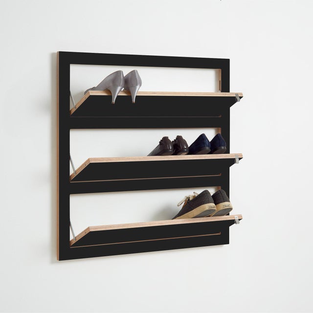 To eliminate mountains of shoes under the wardrobe, all fläpps wall shelves with a small depth can now be converted into a...