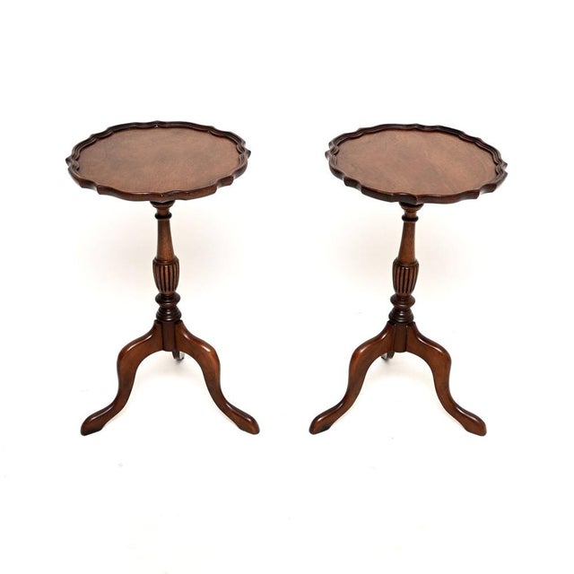A smart and extremely well made pair of antique walnut wine tables. They were made in England, they date from around the...