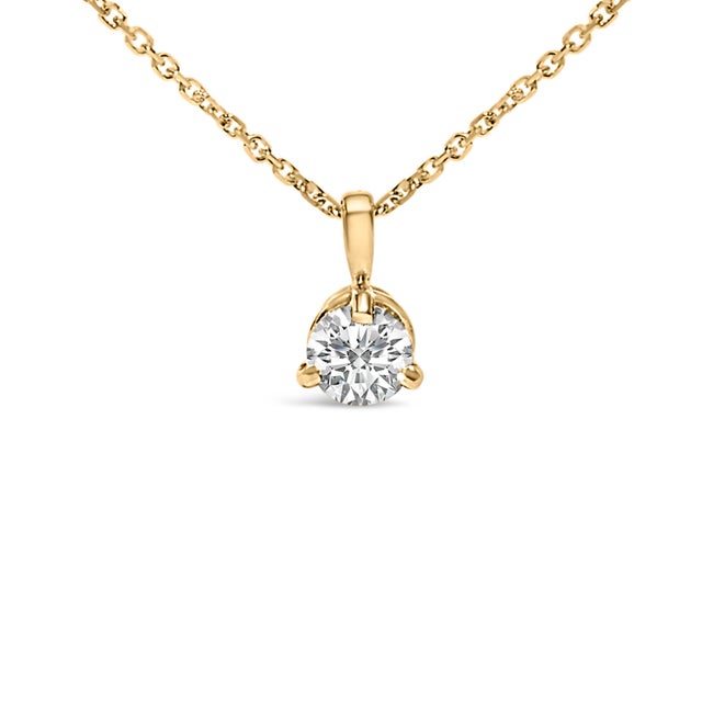 Envelop your neckline with the mesmerizing sparkle of this exquisite pendant necklace, masterfully crafted from lustrous...